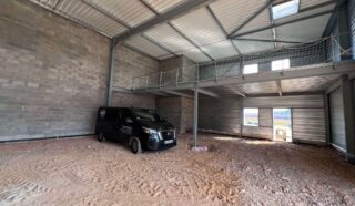  LOCAUX DE STOCKAGE 180 m² LE RHEU