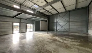  LOCAUX DE STOCKAGE 215 m² LE RHEU